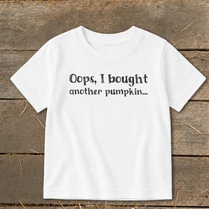 White t-shirt with black text that reads "Oops, I bought another pumpkin..."