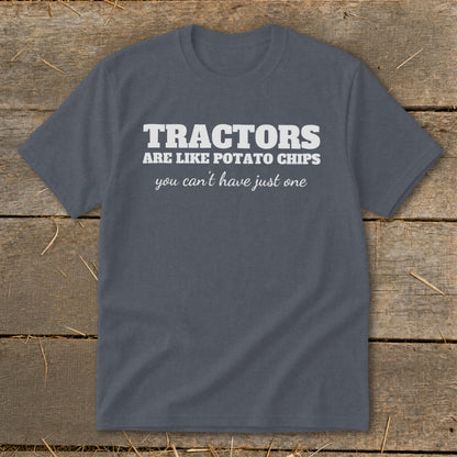 Dark grey t-shirt with white text that reads "TRACTORS ARE LIKE POTATO CHIPS you can't have just one".
