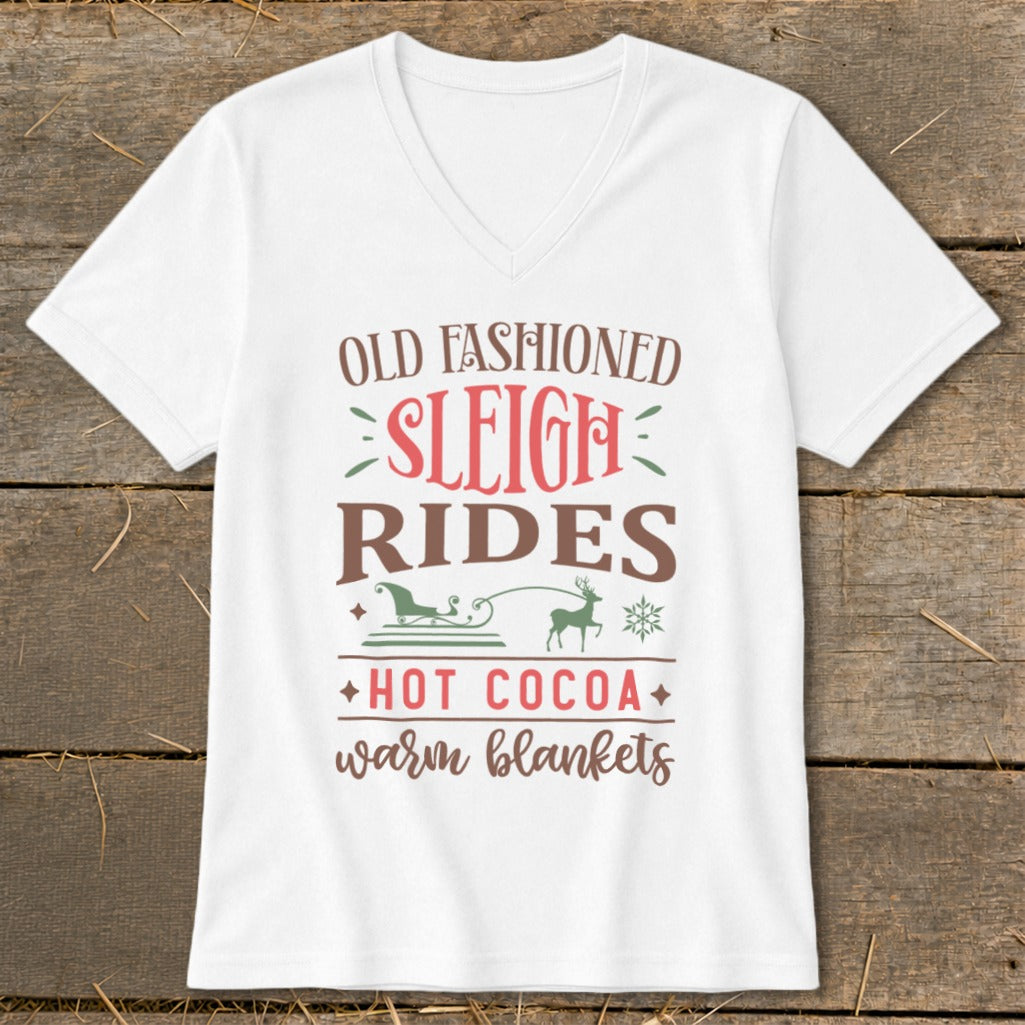 White v-neck t-shirt with "Old Fashioned Sleigh Rides" text and Christmas graphics.