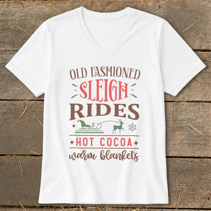 White v-neck t-shirt with "Old Fashioned Sleigh Rides" text and Christmas graphics.