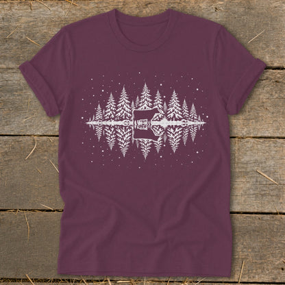 Maroon t-shirt with white reflective forest and mountain graphic.