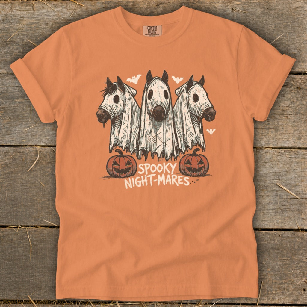 Three horses wear ghost costumes with pumpkins and "Spooky Night-Mares" text.
