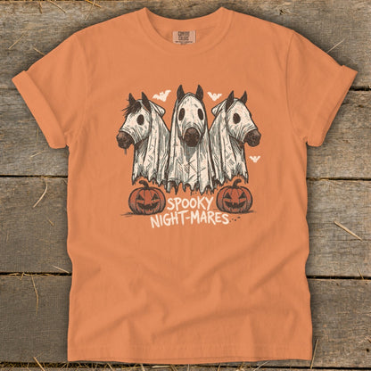 Three horses wear ghost costumes with pumpkins and "Spooky Night-Mares" text.