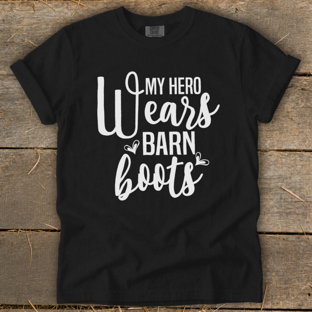 Black t-shirt with white text reading "My Hero Wears Barn Boots."