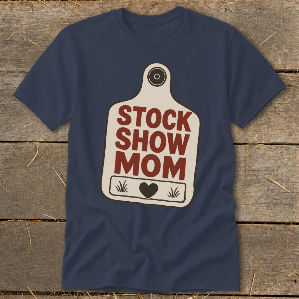 Navy t-shirt with a cow tag graphic that reads "STOCK SHOW MOM".