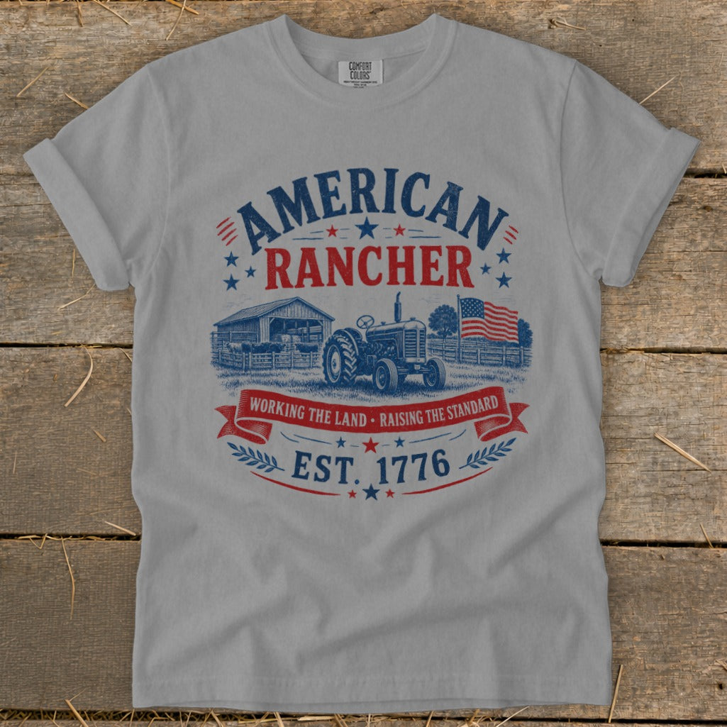 Grey t-shirt with "American Rancher Est. 1776" text and a farm scene.