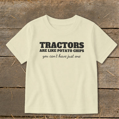 Cream t-shirt with "TRACTORS ARE LIKE POTATO CHIPS you can't have just one" text.