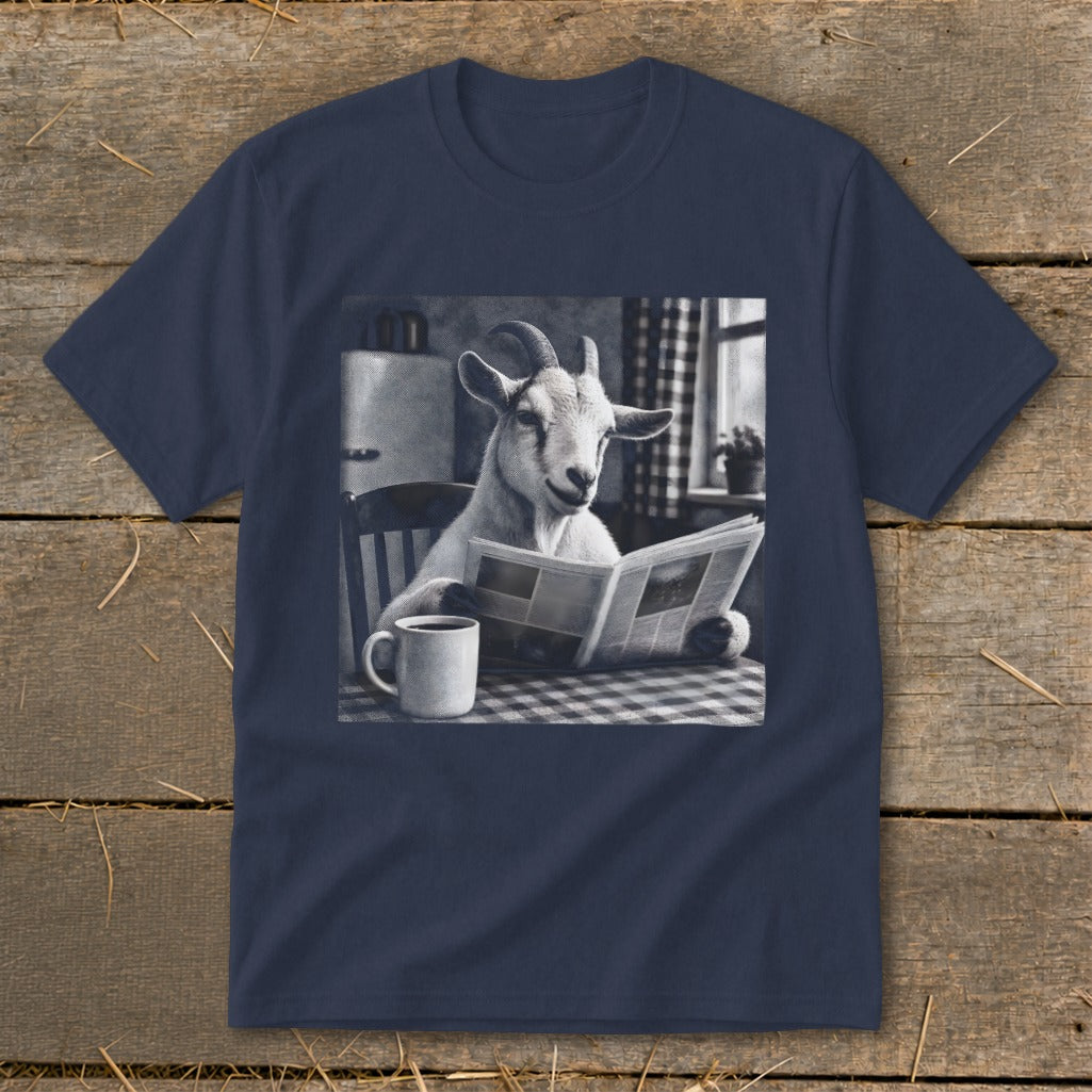 Dark blue t-shirt displaying a black and white graphic of a goat reading a newspaper at a table with a coffee mug.