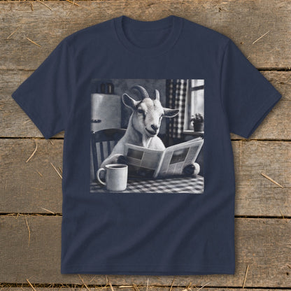 Dark blue t-shirt displaying a black and white graphic of a goat reading a newspaper at a table with a coffee mug.