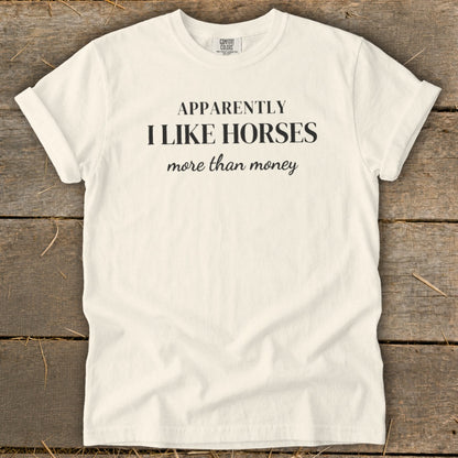 Cream t-shirt with text "APPARENTLY I LIKE HORSES more than money".