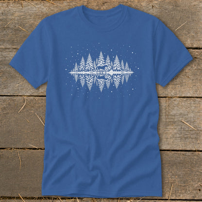 Blue t-shirt with white graphic of a deer in a snowy forest with reflection.