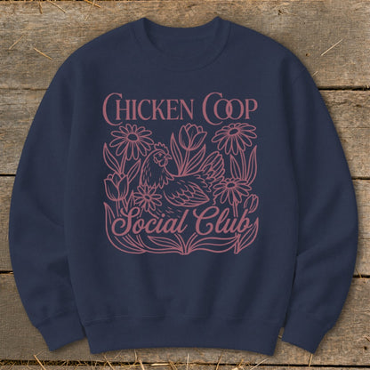 Navy sweatshirt with pink "Chicken Coop Social Club" text and floral chicken design.