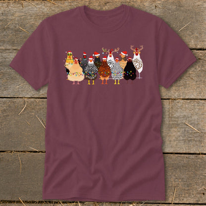 Maroon t-shirt with a line of festive chickens wearing Santa hats and Christmas lights.