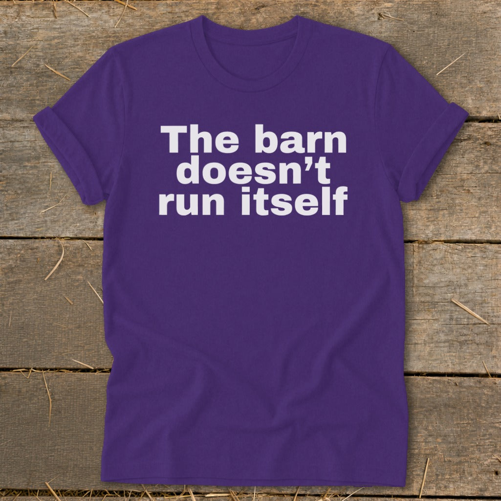 Purple t-shirt with white text "The barn doesn't run itself".