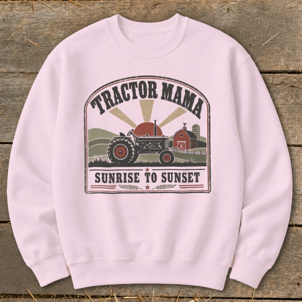 Pink sweatshirt with "Tractor Mama Sunrise to Sunset" graphic featuring a tractor and barn.
