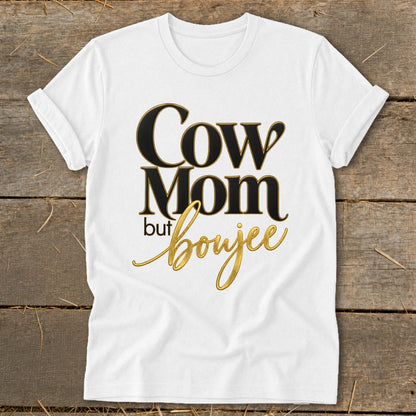 White t-shirt with black and gold text that reads "Cow Mom but boujee".