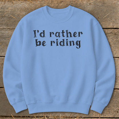 Light blue crewneck sweatshirt with black text "I'd rather be riding".