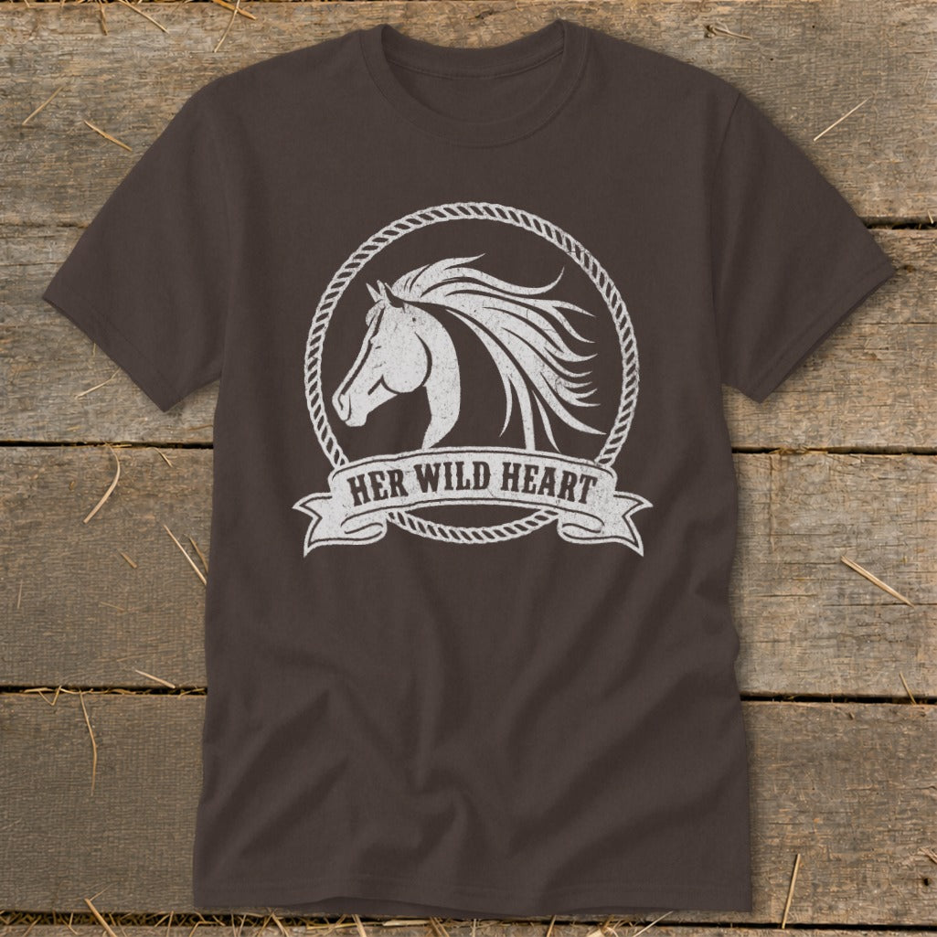 Brown t-shirt with white graphic of a horse head inside a rope circle and text "HER WILD HEART".