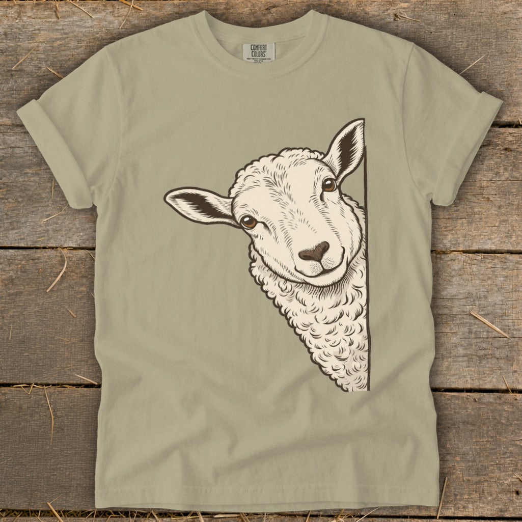 Light tan t-shirt with a peeking sheep graphic and "COMFORT COLORS" logo.