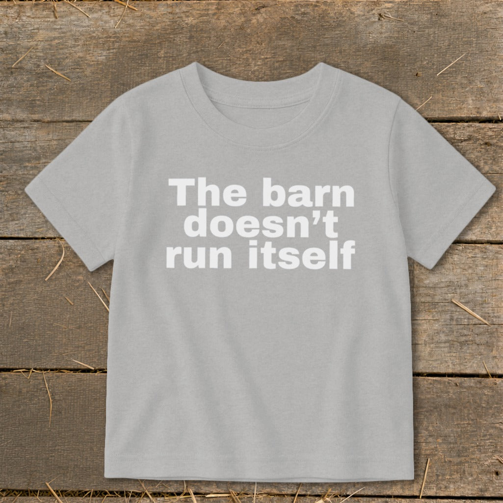 Light gray t-shirt with white text that reads "The barn doesn't run itself".