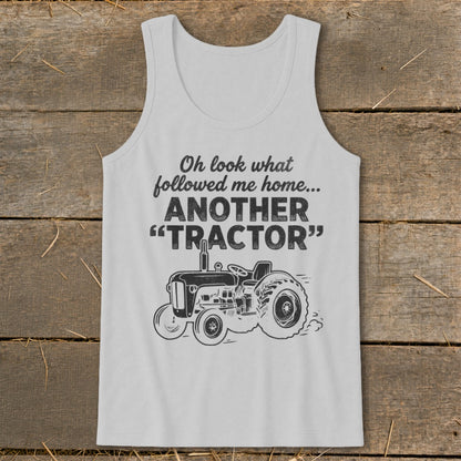 Light gray tank top with "Oh look what followed me home... ANOTHER 'TRACTOR'" and a tractor graphic.