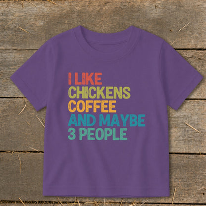 Purple t-shirt with text "I LIKE CHICKENS COFFEE AND MAYBE 3 PEOPLE".
