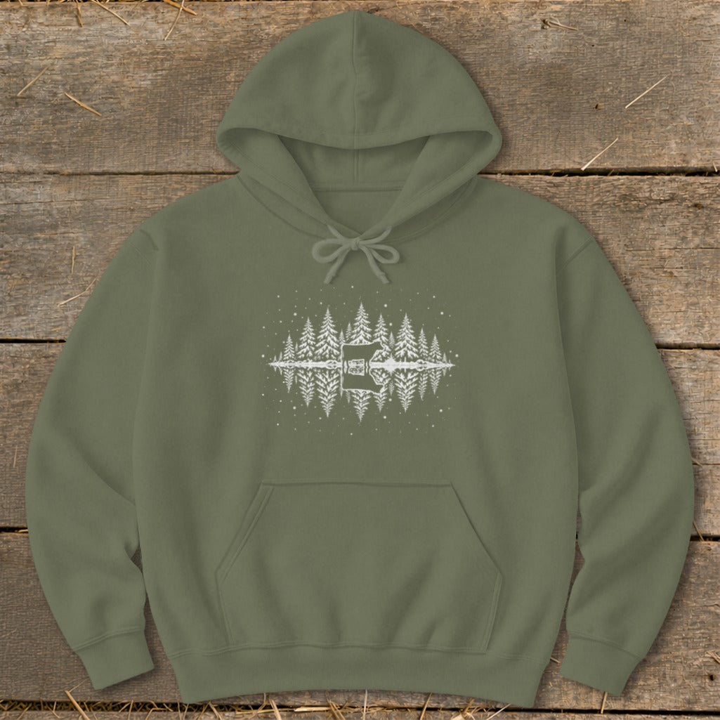 Olive green hoodie with white reflection graphic of trees, a cabin, and a cow.