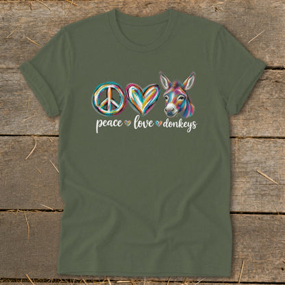 Green t-shirt with "peace love donkeys" text and colorful peace sign, heart, and donkey.