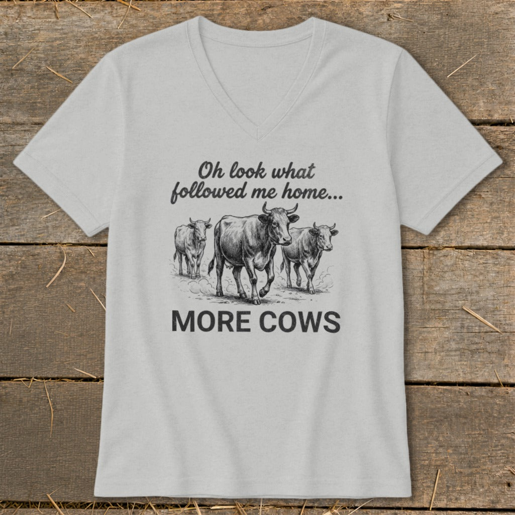 T-shirt with drawing of three cows and text "Oh look what followed me home... MORE COWS".