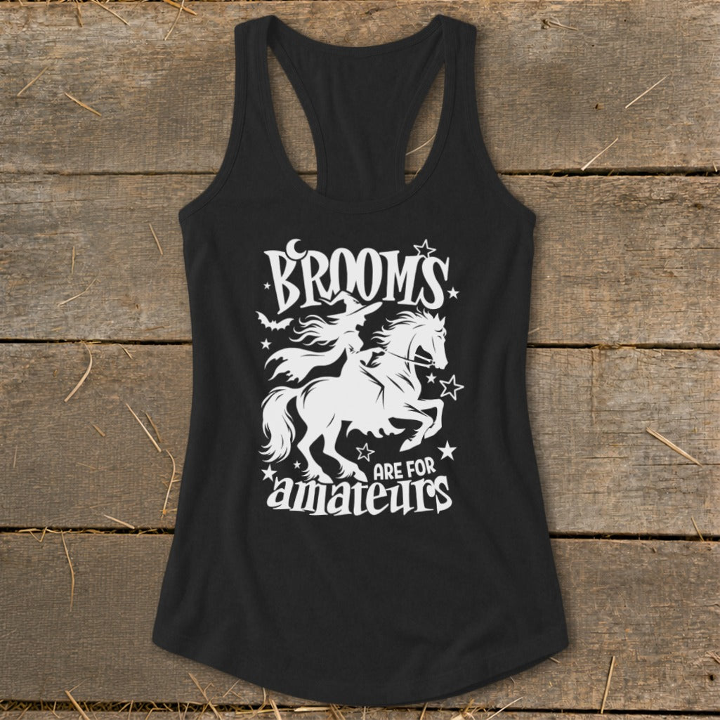 Black tank top with white graphic of witch on a horse and text "Brooms are for amateurs".