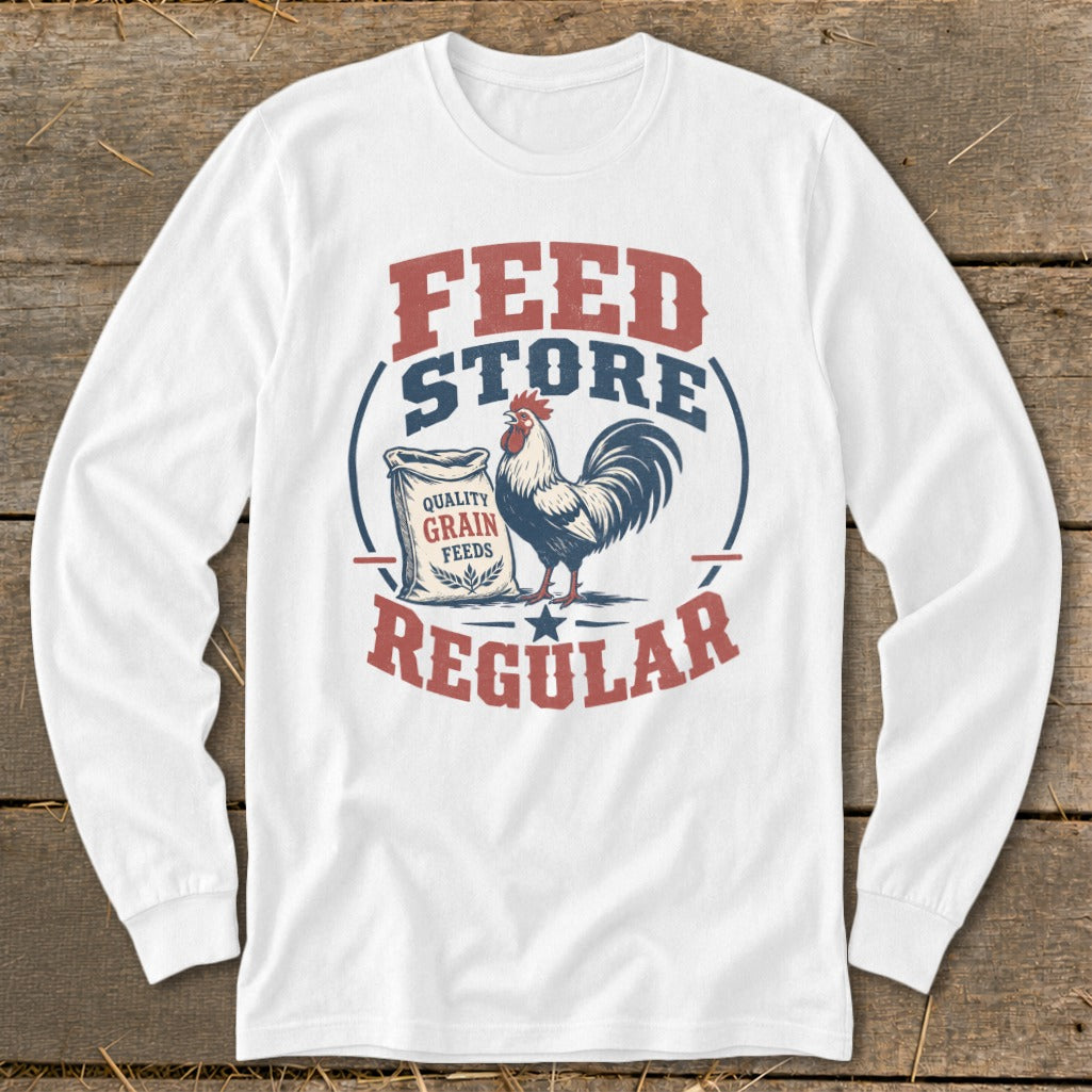 White long-sleeve shirt with "Feed Store Regular" text and a rooster by a grain bag.