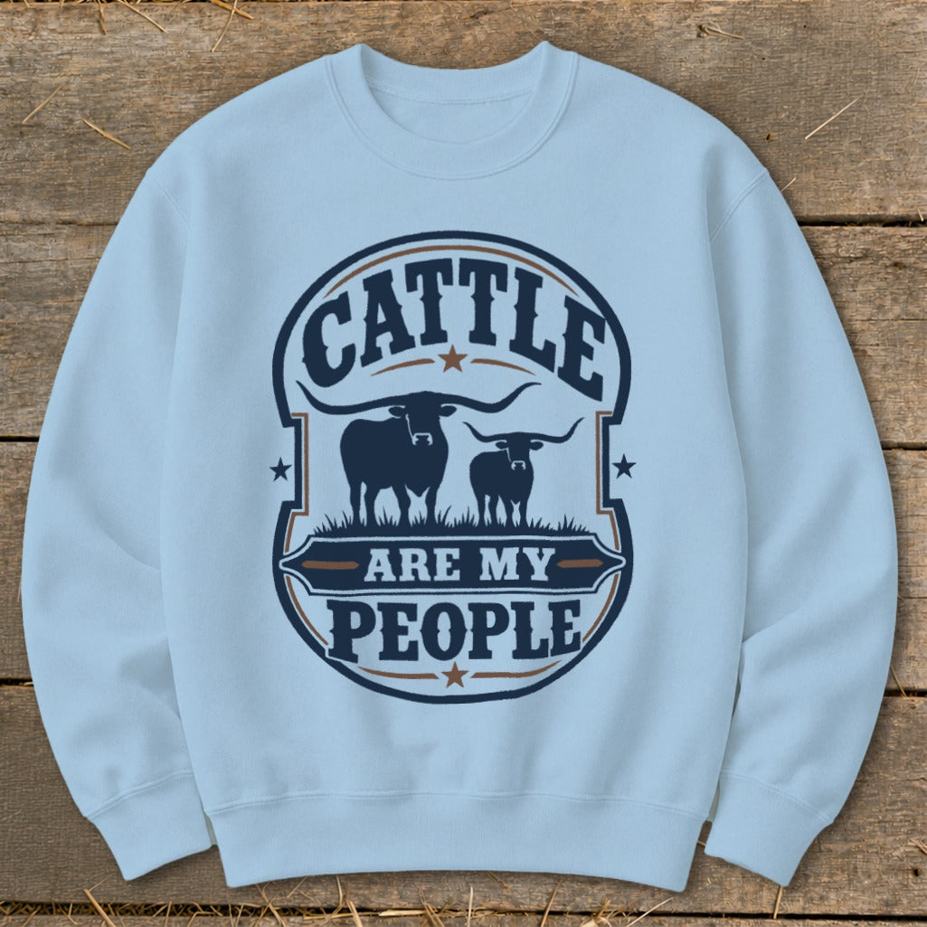Light blue sweatshirt with "Cattle Are My People" graphic featuring two longhorn bulls.