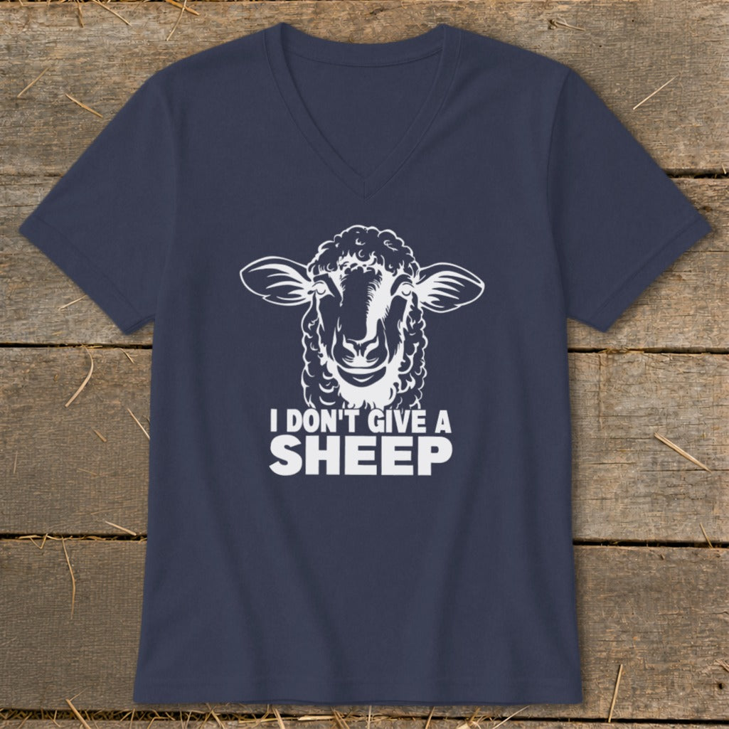 Navy t-shirt with white sheep graphic and text "I DON'T GIVE A SHEEP."