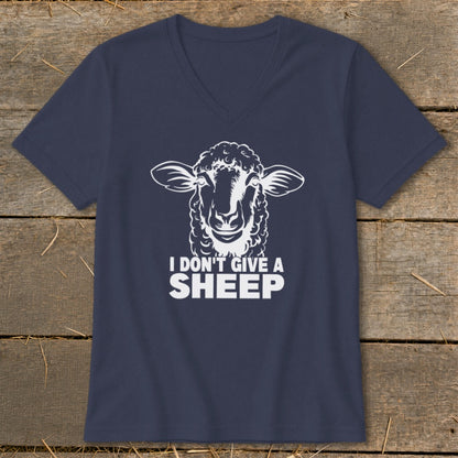 Navy t-shirt with white sheep graphic and text "I DON'T GIVE A SHEEP."