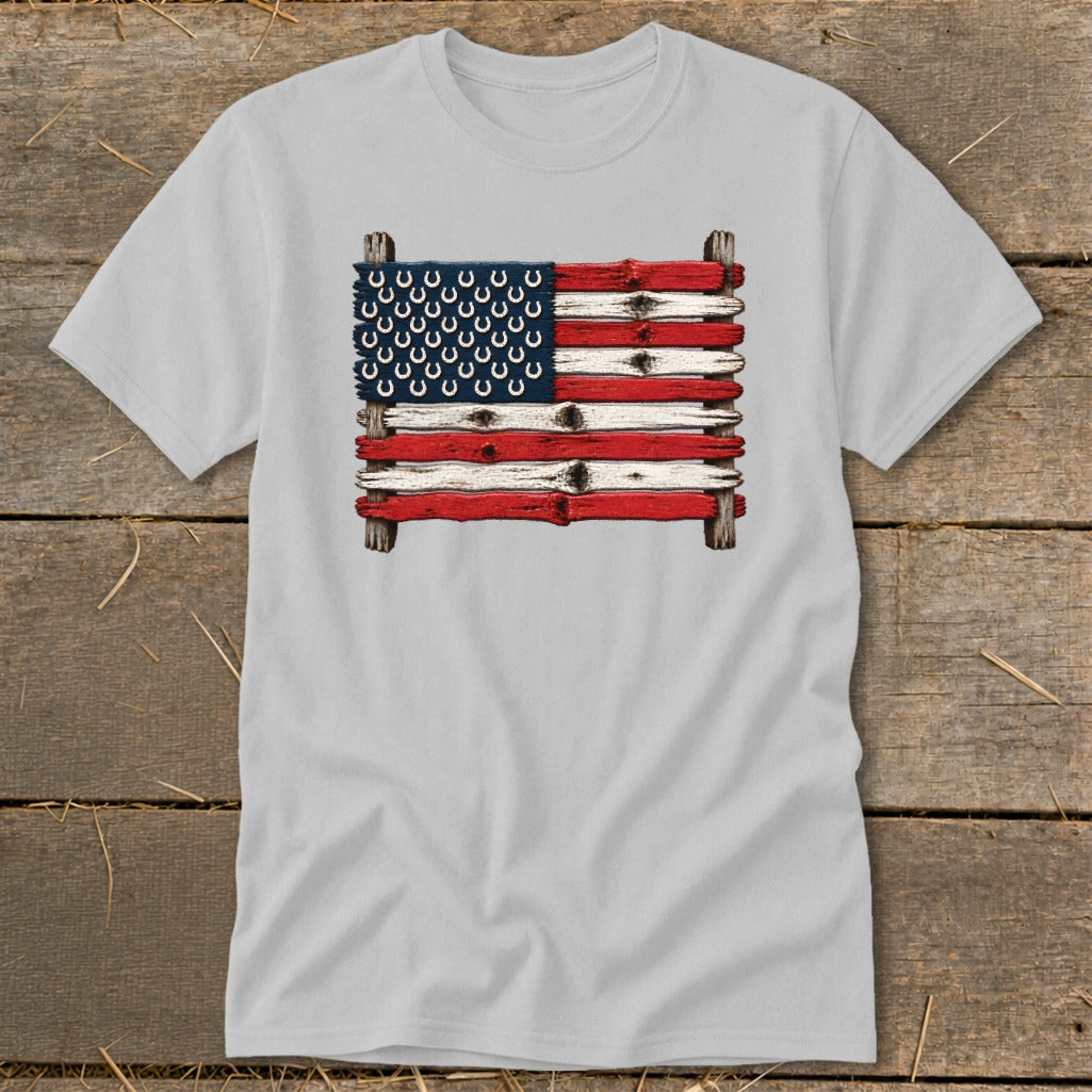 Light gray crewneck t-shirt featuring a graphic of the American flag made from weathered wooden planks and horseshoes.
