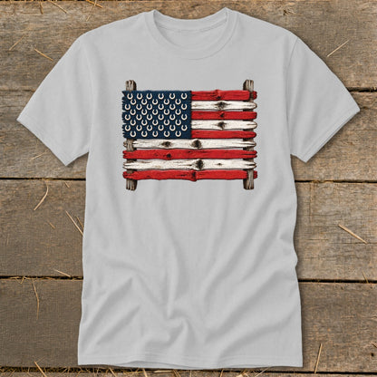 Light gray crewneck t-shirt featuring a graphic of the American flag made from weathered wooden planks and horseshoes.