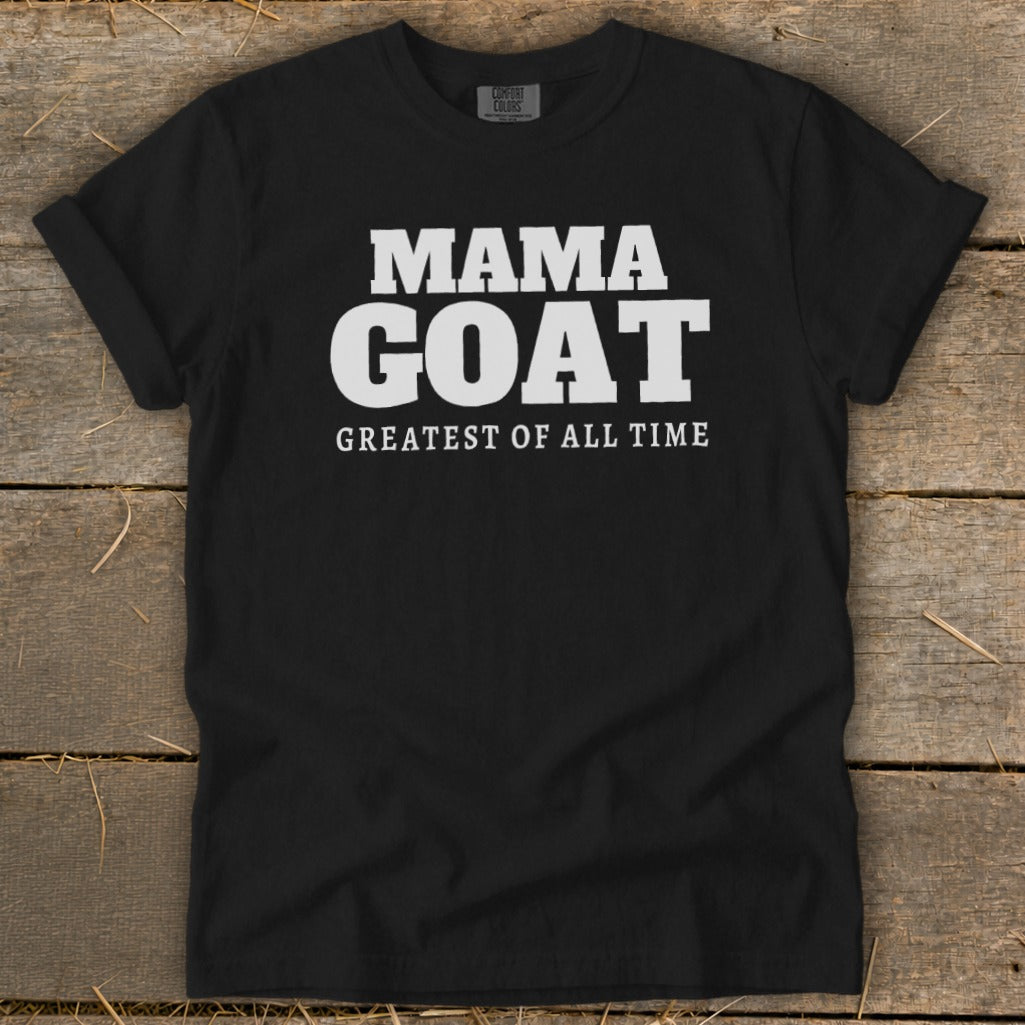 Black t-shirt with white text that reads "MAMA GOAT GREATEST OF ALL TIME".
