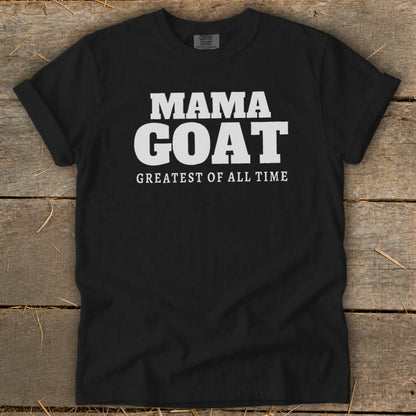 Black t-shirt with white text that reads "MAMA GOAT GREATEST OF ALL TIME".
