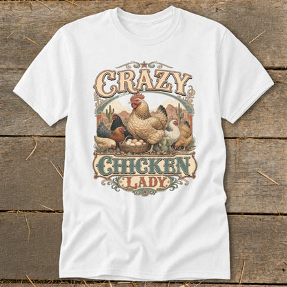 White t-shirt with "Crazy Chicken Lady" text and chickens in a desert landscape.