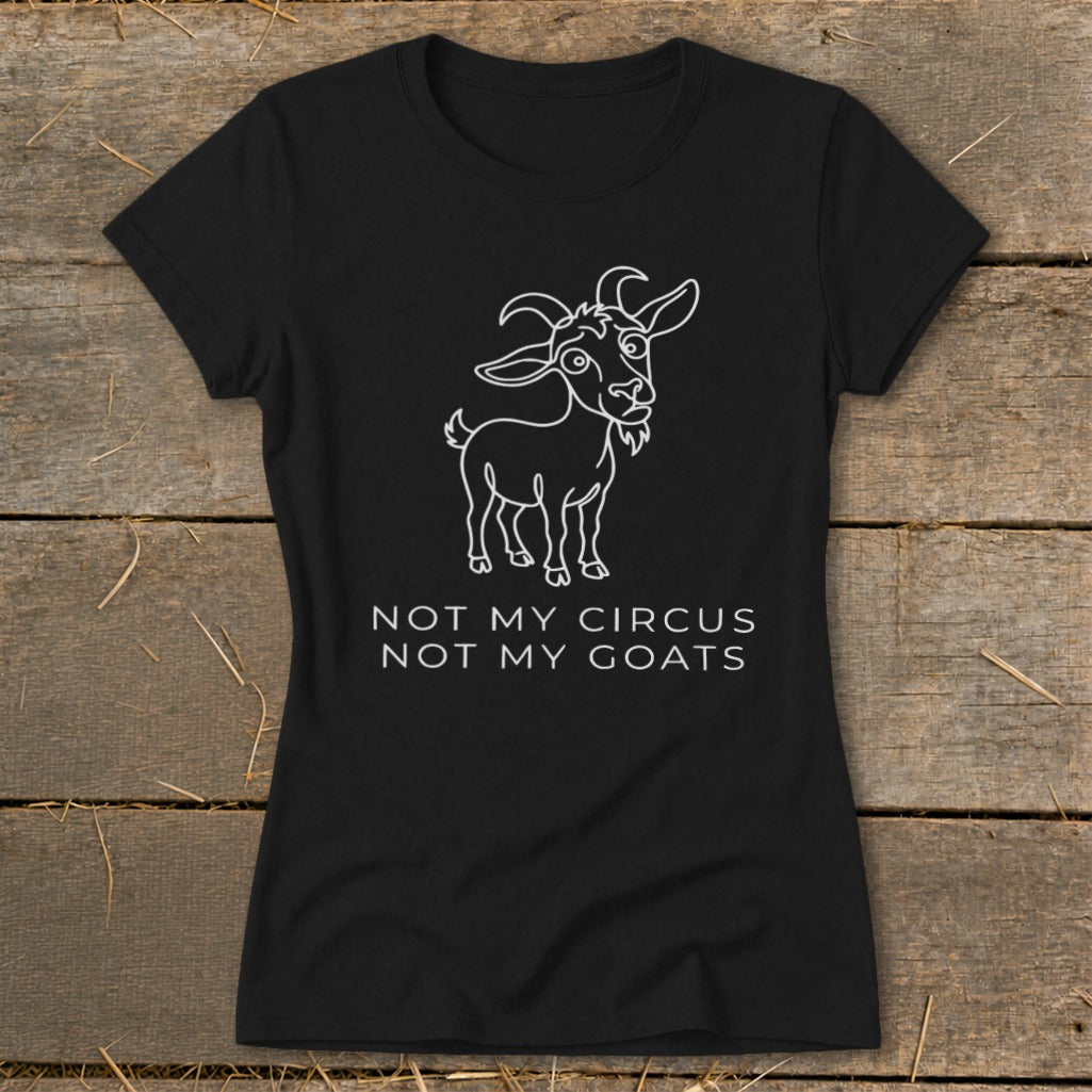 Black t-shirt with white line drawing of a goat and text "NOT MY CIRCUS NOT MY GOATS".