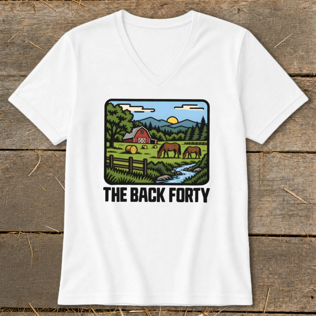 White V-neck t-shirt featuring a pastoral farm graphic with horses, a barn, and the text The Back Forty.