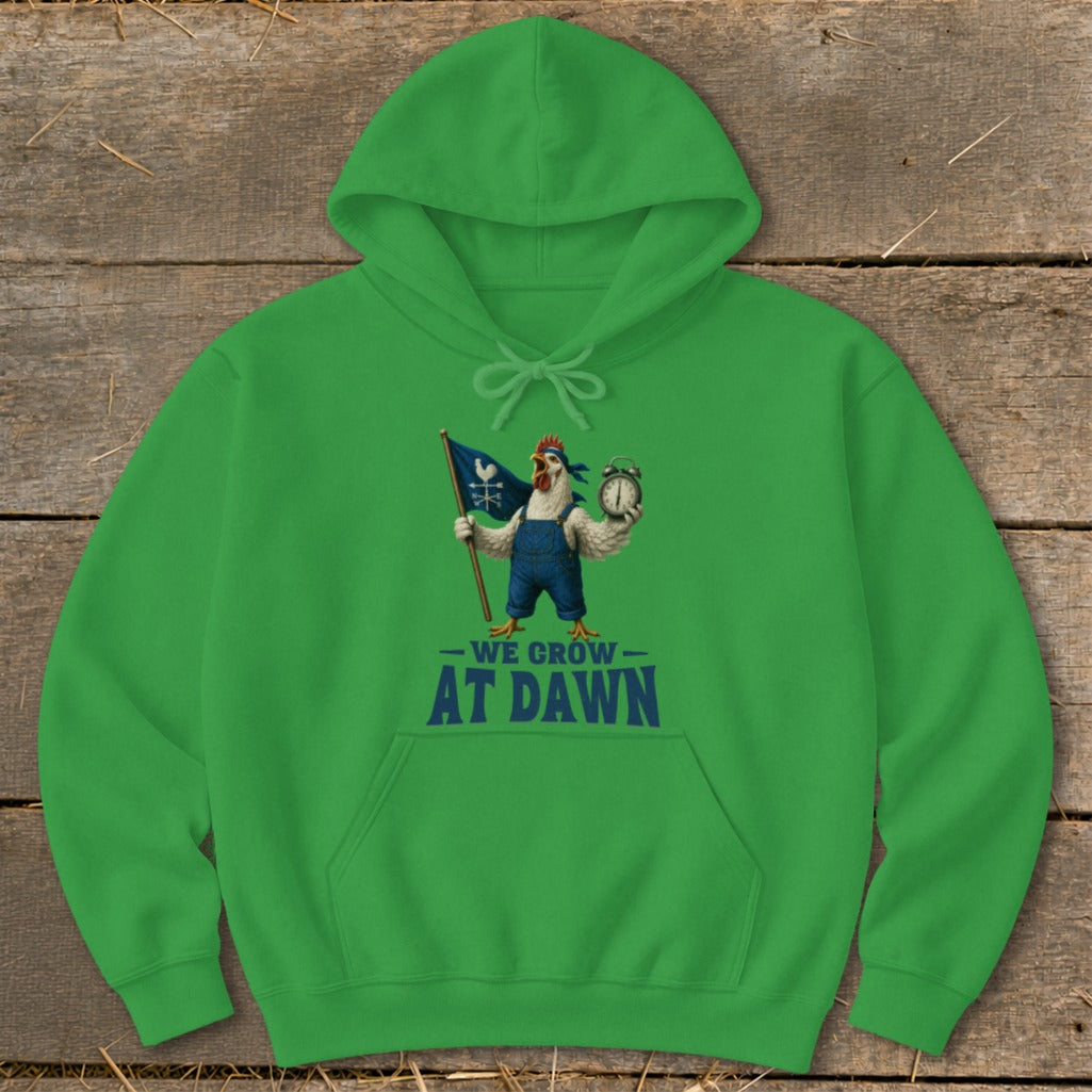 Green hoodie with a chicken in overalls holding a flag and alarm clock, text "WE GROW AT DAWN."