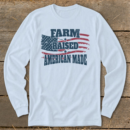 Long-sleeve shirt with distressed American flag and text "FARM RAISED AMERICAN MADE".