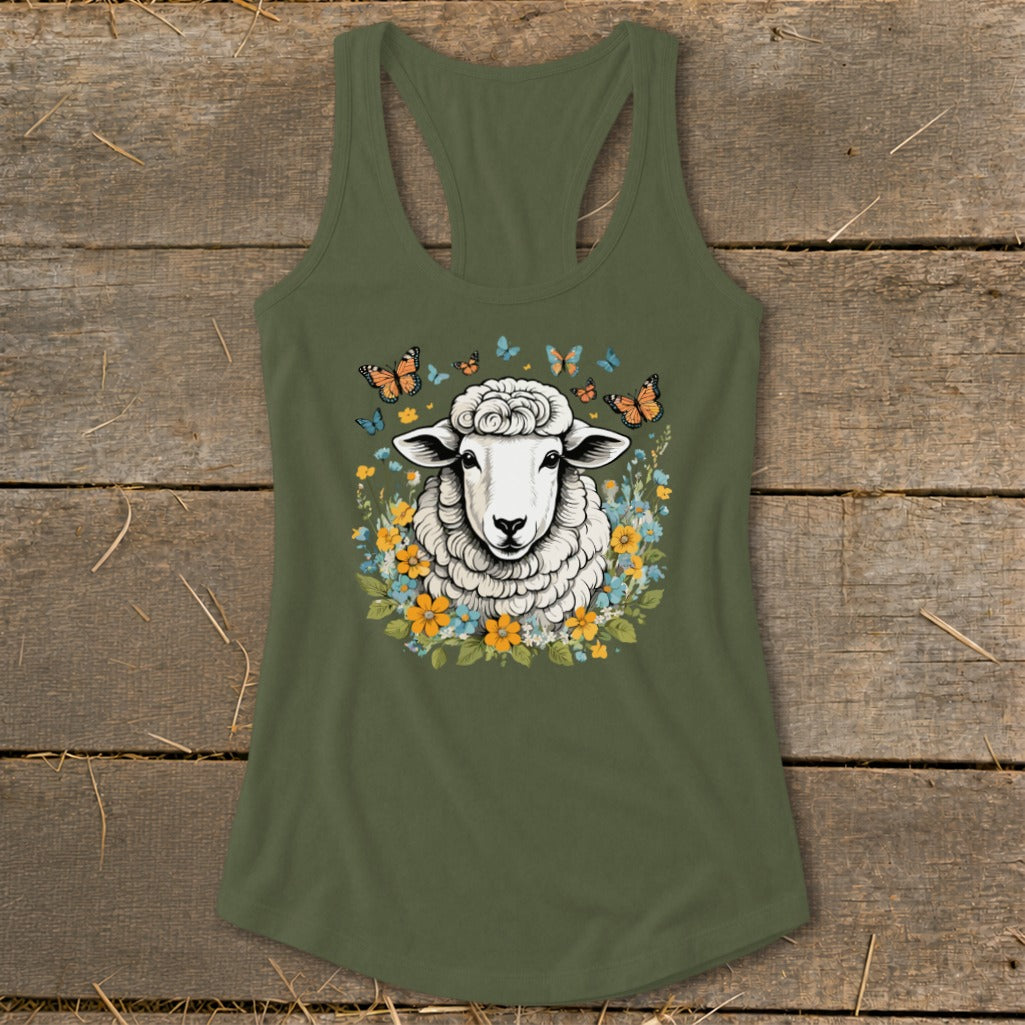 Green tank top with a sheep, flowers, and butterflies graphic.
