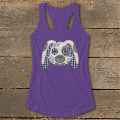 Purple tank top with a stitched dog face appliqué on the front.
