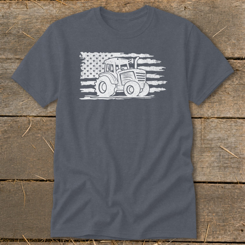 Tractor graphic with distressed American flag design on a charcoal t-shirt.