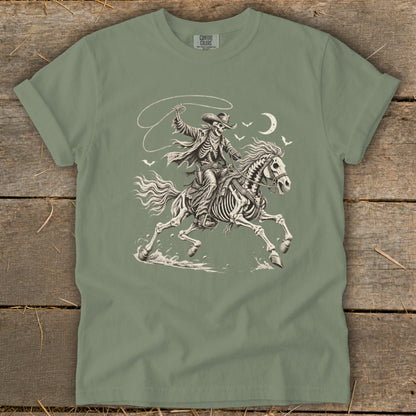 Skeleton cowboy riding a skeleton horse, lassoing under a crescent moon.