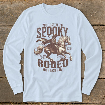 Long sleeve shirt with "Spooky Rodeo" graphic featuring a cowboy and horse.