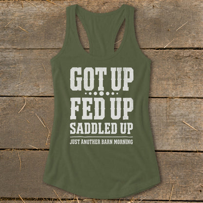 Olive green tank top with white text: "GOT UP FED UP SADDLED UP JUST ANOTHER BARN MORNING".