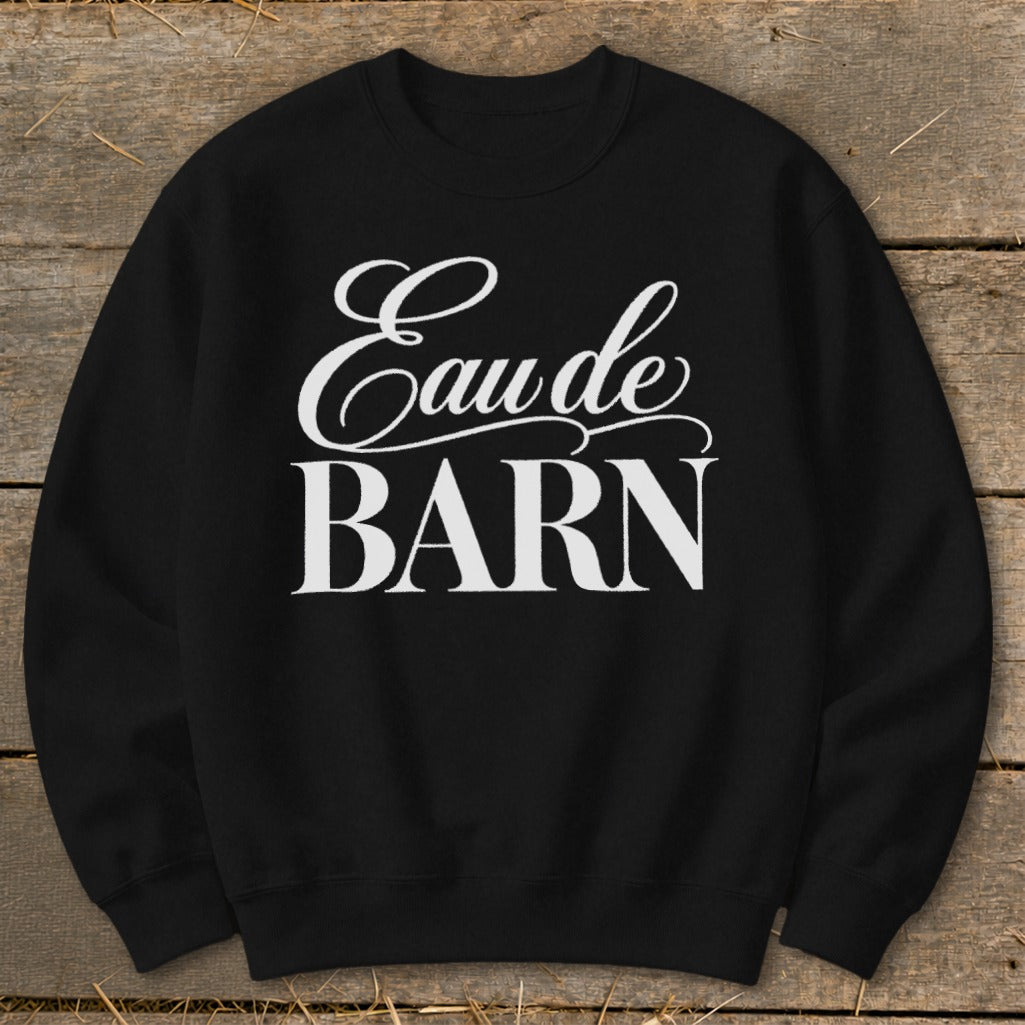 Black sweatshirt with white text that reads "Eau de BARN"